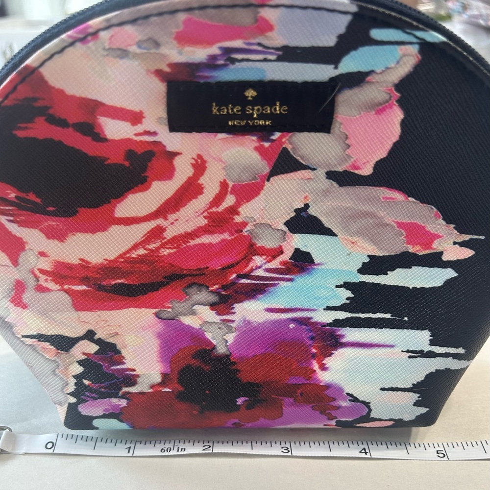 Kate Spade New York cosmetic bag featuring the "Blurry Floral"
